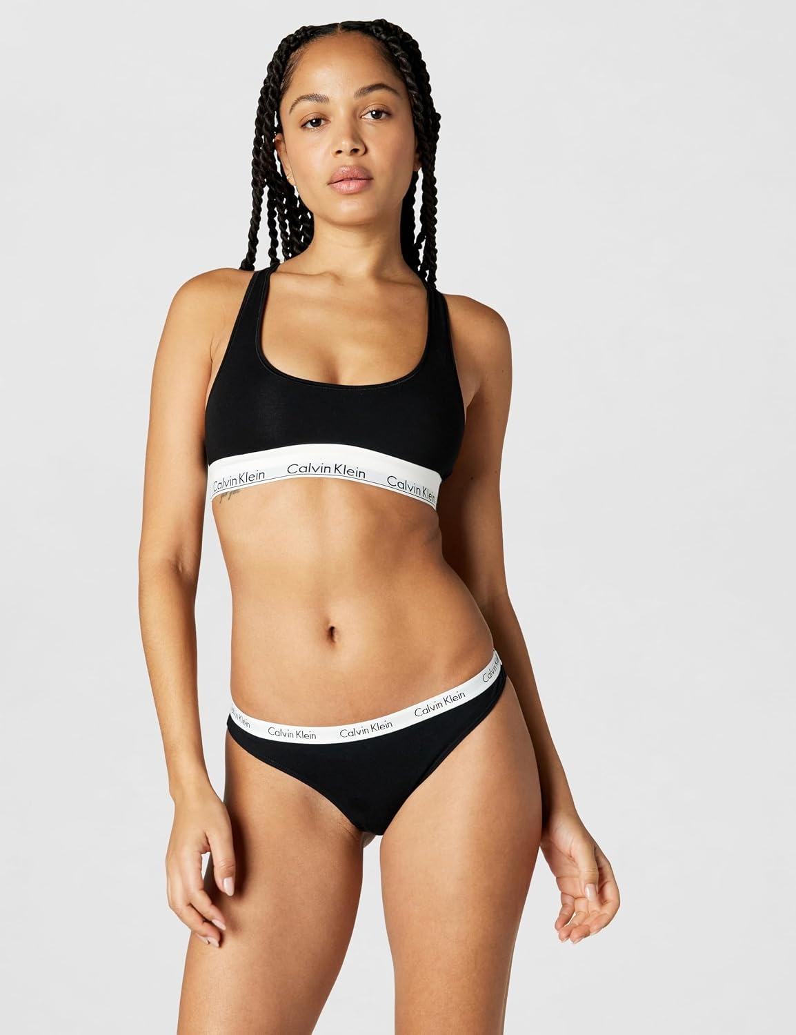 image:imageCalvin Klein womens Carousel Logo Cotton Stretch Thong Panties MultipackBlackWhiteMini Cheetah Black White