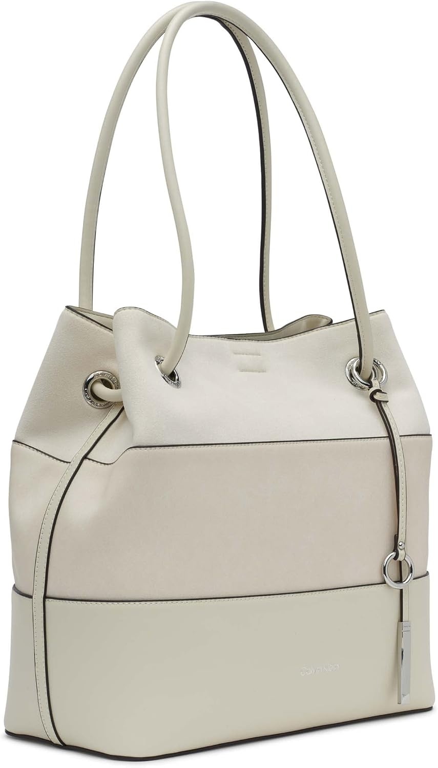 image:imageCalvin Klein Gabrianna Bubble Lamb NorthSouth Key Item ToteCherub White Mixed