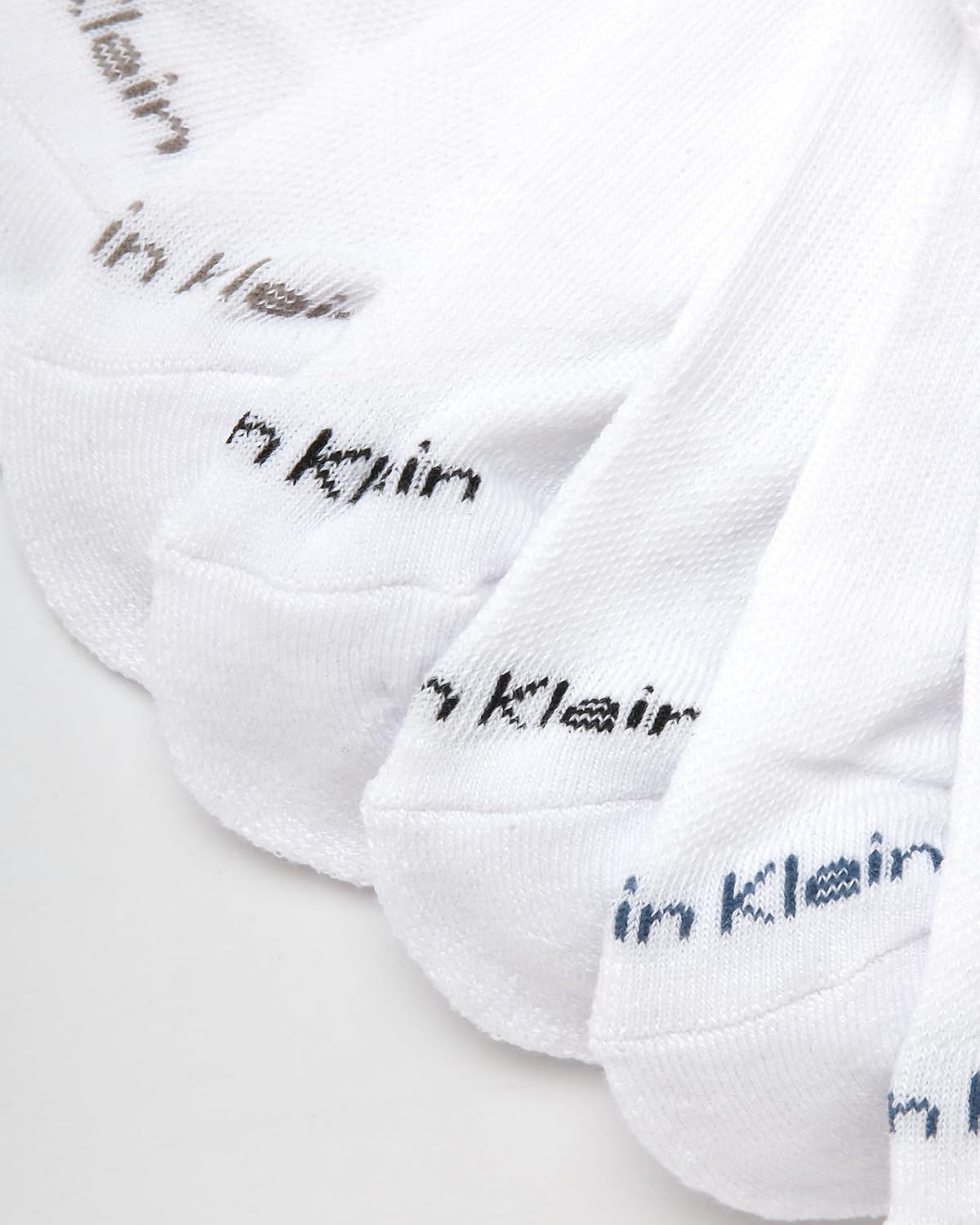 image:imageCalvin Klein Womens No Show Socks 12 Pack Lightweight Cushioned Athletic Tab Low Cut Running Socks for WomenAll White